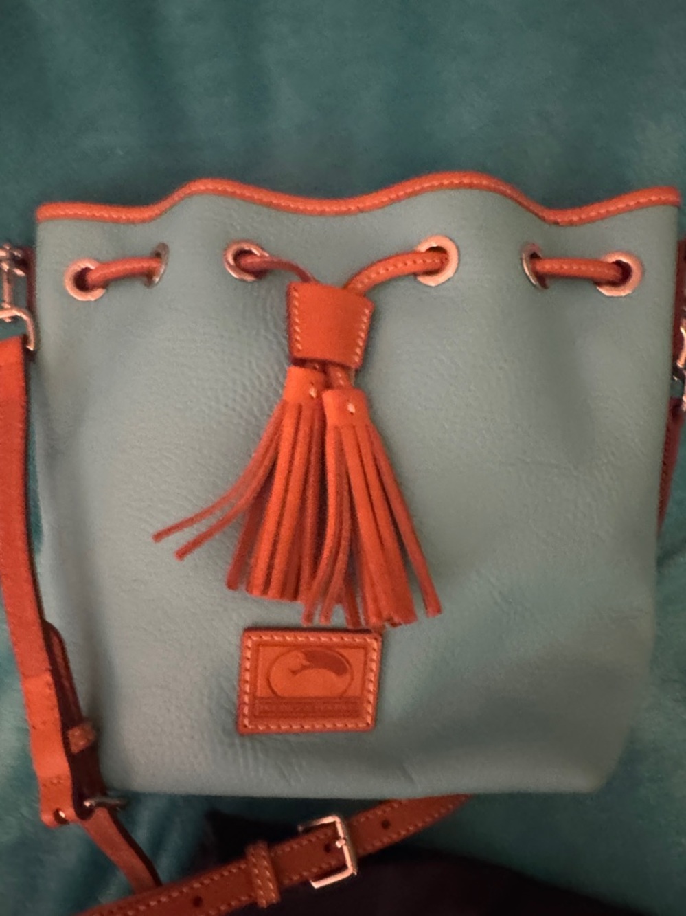 Dooney & Bourke Leather Bucket Bag with Orange Trim and Tassel